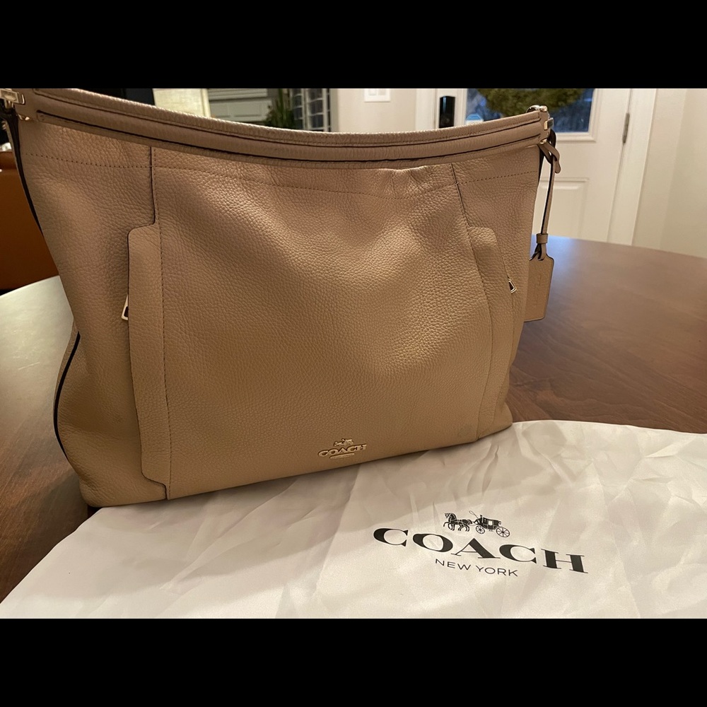 Gently used neutral Coach bag